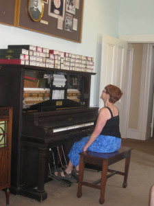 Photo by our friend Madeleine Dames:  Susana at the piano at Scott Joplin's home in St. Louis.